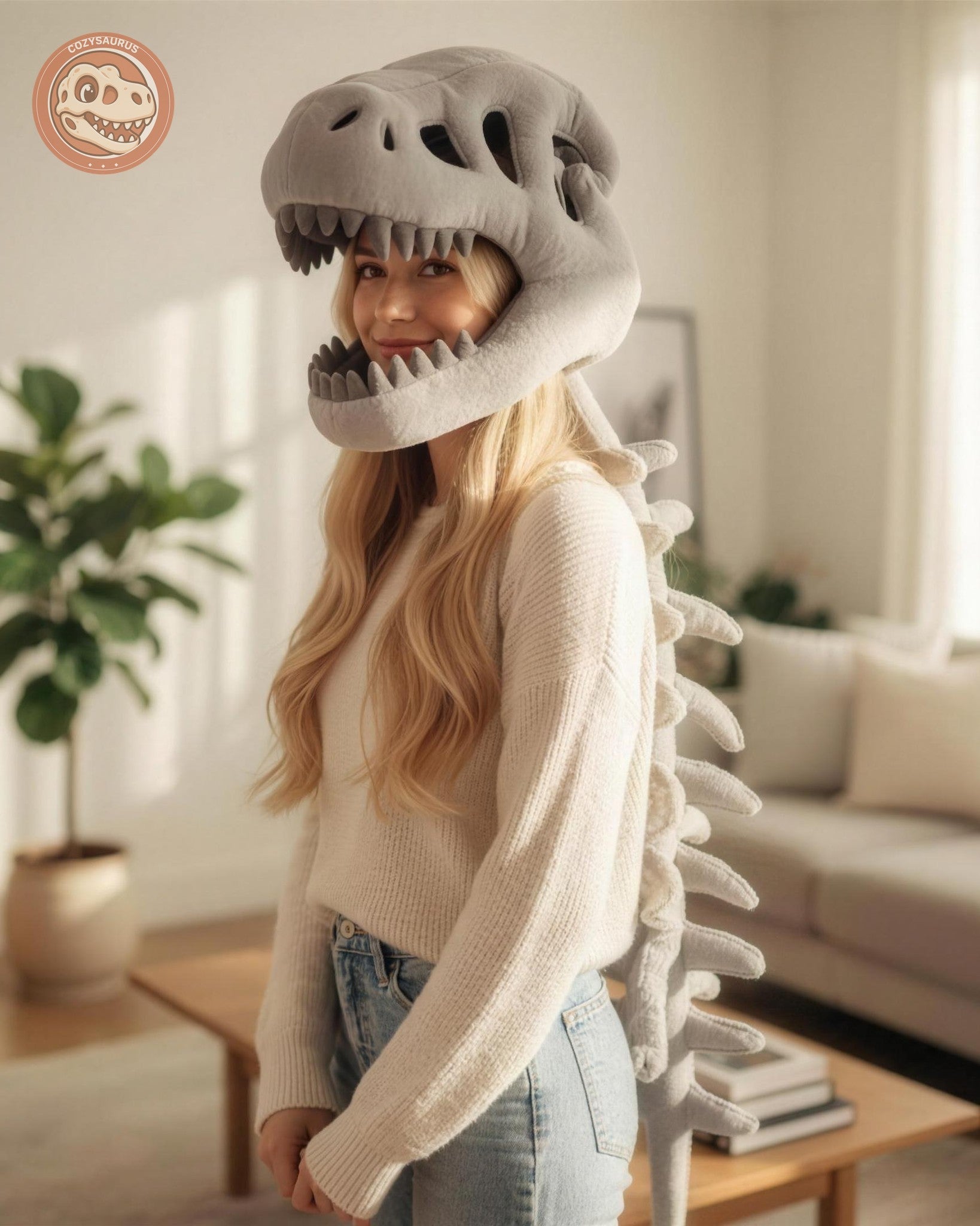 Adult wearing the Cozysaurus dino skeleton hood